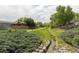 Scenic path with waterway, greenery, and landscaping offers serenity at 10890 Depew Pl, Broomfield, CO 80020