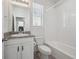 Clean bathroom with granite countertop vanity and a tiled shower/tub combination at 12270 Karls Ln, Northglenn, CO 80241