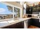 Modern kitchen with stainless steel appliances and granite countertops at 3336 White Oak Ln, Highlands Ranch, CO 80129