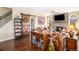 Inviting living room with a stone fireplace and a rustic barn door, perfect for relaxing at 3336 White Oak Ln, Highlands Ranch, CO 80129