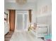 Well-lit Bedroom with plush rug, stylish light fixture, and patio access at 561 Cook St, Denver, CO 80206