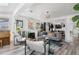 Open living room features modern furnishings, a fireplace, and natural light at 561 Cook St, Denver, CO 80206