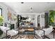 An open living room featuring neutral colors, a fireplace, and natural light at 561 Cook St, Denver, CO 80206