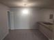 Dining area with chandelier, next to kitchen counter at 12148 Melody Dr # 108, Denver, CO 80234