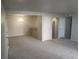 Spacious living room with access to the kitchen at 12148 Melody Dr # 108, Denver, CO 80234