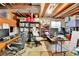 Finished basement used as an office space with exposed wood beams and storage shelves at 5826 S Jebel Way, Centennial, CO 80015