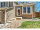 Inviting entrance with brick accents and a well-maintained walkway at 5826 S Jebel Way, Centennial, CO 80015
