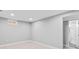 Recently renovated basement featuring new carpet, neutral walls, and an updated bathroom at 3630 Magnolia St, Denver, CO 80207