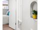 Cozy bedroom detail showcasing a plant in an alcove, with an adjacent room in the background at 3630 Magnolia St, Denver, CO 80207