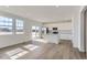 Bright, open kitchen featuring stainless steel appliances and an island with modern finishes at 16622 E 109Th Ave, Commerce City, CO 80022