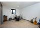 Basement room with a drumset and guitar at 8 Lindenwood Dr, Littleton, CO 80120