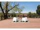 Outdoor deck showcasing comfortable seating, ideal for enjoying peaceful moments and neighborhood views at 8 Lindenwood Dr, Littleton, CO 80120