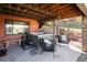 Relaxing outdoor hot tub area with stylish seating and a serene ambiance for unwinding at 8 Lindenwood Dr, Littleton, CO 80120