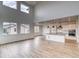 Beautiful view of kitchen and the open-concept living room with tall ceilings and modern appliances at 2197 S Jackson Gap St, Aurora, CO 80018