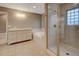 Well-maintained bathroom featuring shower stall, soaking tub, vanity and tile flooring at 1275 Fairfax St, Denver, CO 80220