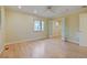 Bright bedroom featuring hardwood floors, a ceiling fan, natural light, and fresh paint at 1275 Fairfax St, Denver, CO 80220