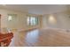 Expansive living space with hardwood floors, large windows, and neutral walls for versatile decor at 1275 Fairfax St, Denver, CO 80220