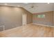 Vaulted main bedroom features skylight, ceiling fan, and light hardwood floors at 1275 Fairfax St, Denver, CO 80220