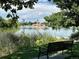 Relaxing park view with a lake, downtown, and a comfortable bench at 1275 Fairfax St, Denver, CO 80220