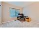 Bedroom with neutral walls, carpet, and a window with blinds at 12362 Nate Cir, Parker, CO 80134
