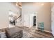Inviting entryway with a staircase, laundry room access, and a view into the dining area, complete with neutral tones at 12362 Nate Cir, Parker, CO 80134
