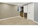 Spacious finished basement featuring a wet bar and a wine fridge at 2046 S Quitman St, Denver, CO 80219