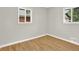 Cozy bedroom with hardwood floors and natural light at 2046 S Quitman St, Denver, CO 80219