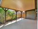 The carport is in the backyard of the home at 2046 S Quitman St, Denver, CO 80219
