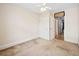 Bedroom featuring neutral walls, carpet, and a ceiling fan that leads to the hallway at 709 27Th St, Denver, CO 80205