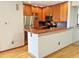 Modern kitchen with stainless steel appliances, updated cabinets, and beautiful countertops at 611 E 7Th Ave, Denver, CO 80203