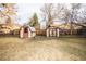 Backyard with two sheds and a wooden fence at 1409 S Moline St, Aurora, CO 80012