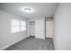 Clean bedroom with window, neutral carpet, paint, closet, and ceiling light fixture at 1409 S Moline St, Aurora, CO 80012