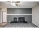 Living room showing painted fireplace with tiled bench and new carpeting at 1409 S Moline St, Aurora, CO 80012