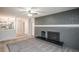 Open-concept living room with fireplace and easy access to the kitchen and dining area at 1409 S Moline St, Aurora, CO 80012