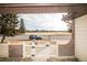 Charming view from the home's entrance, showcasing a serene street and well-maintained landscaping at 1409 S Moline St, Aurora, CO 80012