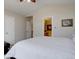 Bright bedroom with a view to the ensuite bathroom at 19414 E Mann Creek Dr # C, Parker, CO 80134