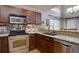 Modern kitchen with stainless steel appliances and granite countertops at 19414 E Mann Creek Dr # C, Parker, CO 80134