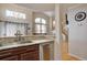 Bright kitchen with stainless steel appliances, granite countertops, and eat-in breakfast area at 19414 E Mann Creek Dr # C, Parker, CO 80134