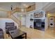 Spacious living room with a fireplace, wood floors, and open floor plan at 19414 E Mann Creek Dr # C, Parker, CO 80134
