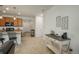 Inviting living room featuring an open layout, modern decor, and a seamless flow to the kitchen at 6317 Vista Cliff Loop, Castle Rock, CO 80104
