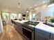 Modern kitchen island with stainless steel appliances and white countertops at 2176 S Birch St, Denver, CO 80222