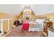 Cozy bedroom with sloped ceilings, natural light, and decorative area rug at 4054 Wyandot St, Denver, CO 80211