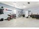 Spacious garage with motorcycle, bicycle, storage, and natural light at 4054 Wyandot St, Denver, CO 80211