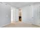 Bedroom featuring carpet, an ensuite bathroom, a closet and white walls at 1419 Great Western Dr, Longmont, CO 80501