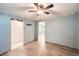 Unfinished basement with new laminate flooring and high ceilings at 68 W 81St Pl, Denver, CO 80221