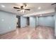 Unfinished basement with new laminate flooring and high ceilings at 68 W 81St Pl, Denver, CO 80221