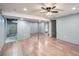 Unfinished basement with new laminate flooring and high ceilings at 68 W 81St Pl, Denver, CO 80221