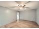 Simple bedroom with ceiling fan and light wood-look flooring at 68 W 81St Pl, Denver, CO 80221