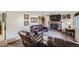 Living room with fireplace and brown leather furniture at 68 W 81St Pl, Denver, CO 80221