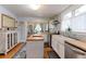 Well-equipped kitchen with butcher block counters, stainless appliances, and a functional island at 1434 Osceola St, Denver, CO 80204